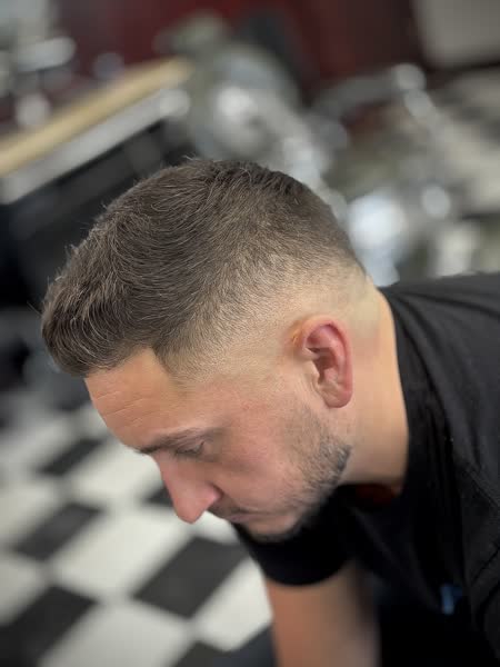 Short crop with a high skin fade and sharp line-up at Salt City Barber Shop in Liverpool, NY